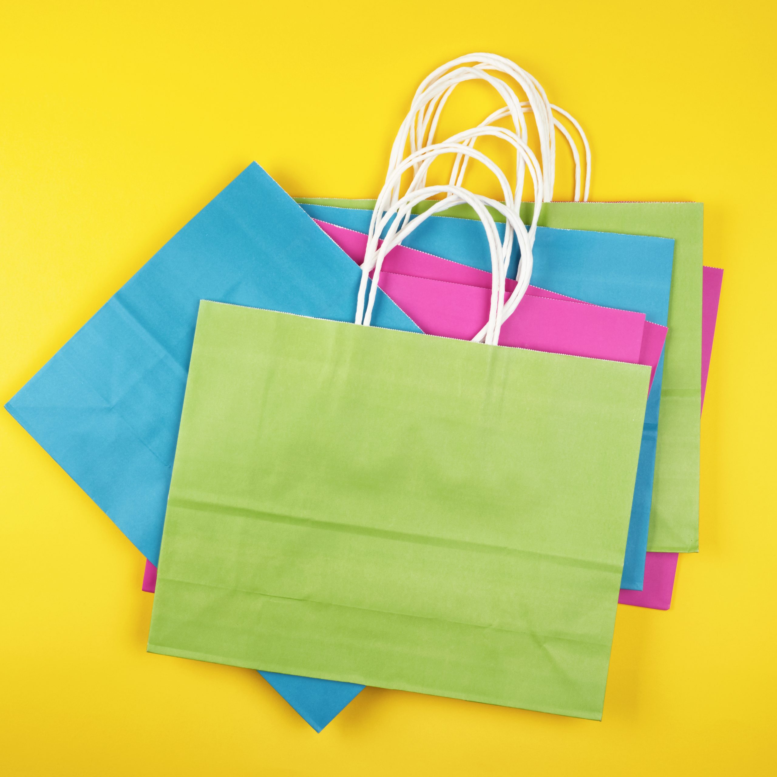 rectangular multi-colored paper shopping bags